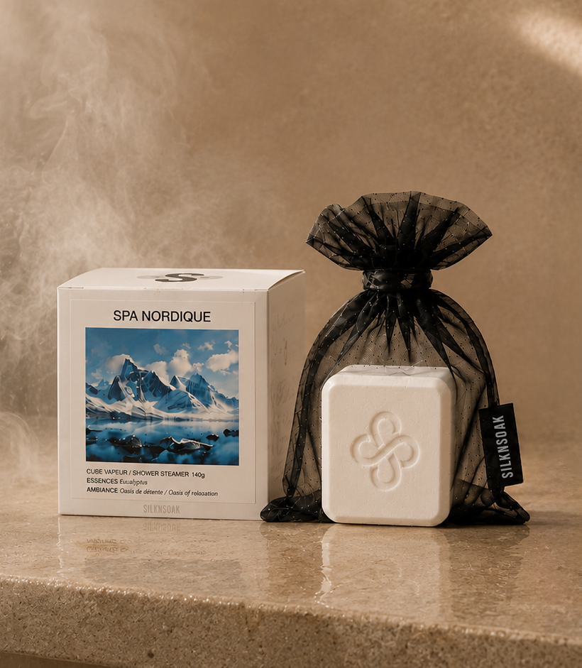 Silknsoak long-lasting shower steamer cube with organza bag in warm steam-filled shower environment

